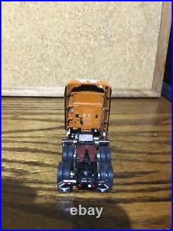 1/64DCP U of TEXAS INTERNATIONAL TRACTOR & LOWBOY WITH CHAMPION TRACTOR AS LOAD