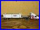 1_64dcp_Sooners_International_Tractor_Dcp_Dropdeck_With_Cp_Rail_Container_Load_01_nl