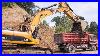 Big_Digger_Large_Excavator_And_Dump_Truck_Moving_Dirt_01_uxac