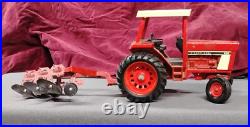 ERTL 1976 International Harvester 886 Tractor Dual Rear Wheels 4 Bottom Plow ERTL 1976 International Harvester 886 Tractor Dual Rear Wheels 4 Bottom Plow