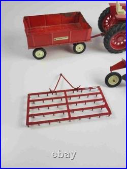ERTL International Harvester Farmall 1026 Hydro Tractor + Wagon Rake Tiller