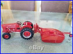 ERTL die cast red International Harvester 300 tractor mower deck brush hog 116