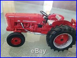 ERTL die cast red International Harvester 300 tractor mower deck brush hog 116