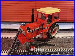 Ertl International 1066 withBlack Stripe & Cab 1/16 Diecast Farm Tractor Replica