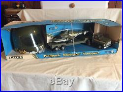 Ertl Toys 1987 Wolfpack Helicopter & Transport Truck withHelmet In Box