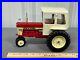 IH_McCormick_Farmall_560_Tractor_with_Cab_Muffler_rare_variation_116_ERTL_Vintage_01_nw