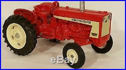 International 606 1/16 diecast farm tractor replica collectible by Spec Cast