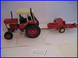 International Harvester Farm Toy Tractor Hydro 186 with IH Baler Ertl 1/16