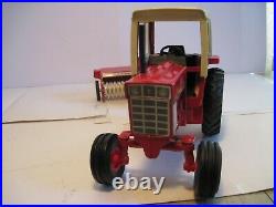 International Harvester Farm Toy Tractor Hydro 186 with IH Baler Ertl 1/16