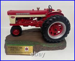 International Harvester Farmall 560 Tractor with Sculpted Base and Plaque