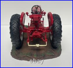 International Harvester Farmall 560 Tractor with Sculpted Base and Plaque