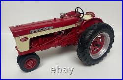 International Harvester Farmall 560 Tractor with Sculpted Base and Plaque