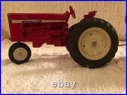 International Harvester VIntage Red Tractor and Grain Wagon