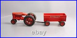 International Harvester Vintage Farmall Plastic Tractor Toy withMcCormick Trailer