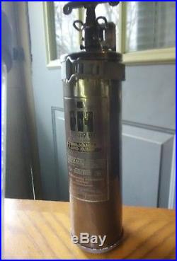 Old Brass International Harvester Fire Extinguisher Tractor Scout II Cub A C D