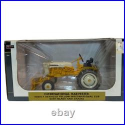 SpecCast International Harvester Cub Tractor Yellow with Blade & Chains