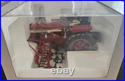 Speccast 544 International Harvester & 4 Row Cultivator