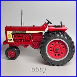 This is an International Harvester Farmall 806 tractor model