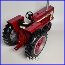 This is an International Harvester Farmall 806 tractor model