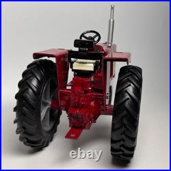This is an International Harvester Farmall 806 tractor model