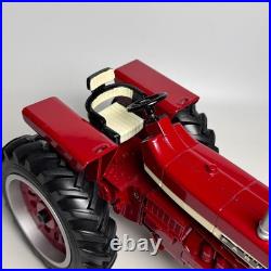 This is an International Harvester Farmall 806 tractor model