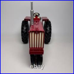 This is an International Harvester Farmall 806 tractor model