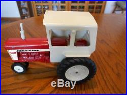 Vintage 1968 ERTL 116 Farmall 560 Tractor with Cab, Stock No. 409, Narrow Front