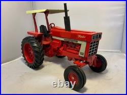 Vintage ERTL IH 1066 Farmall Turbo Tractor WF, ROPS original paint exc. Conditio