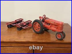 Vintage IH International Harvester Farmall M Tractor 116 with Disc Plow