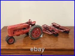 Vintage IH International Harvester Farmall M Tractor 116 with Disc Plow