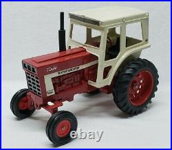 Vintage International Farmall 1066 White Stripe with Cab 1/16 Scale by Ertl